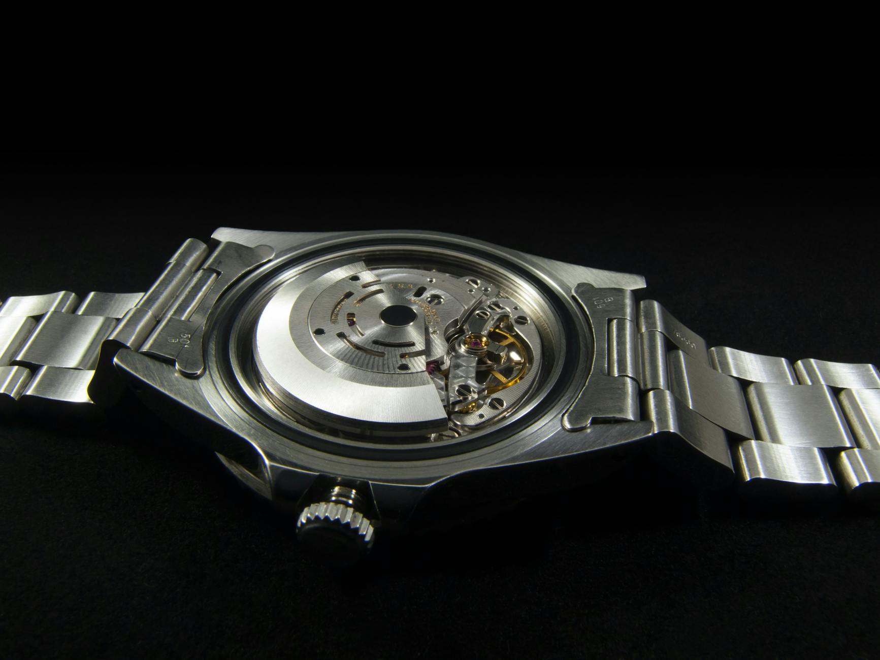 silver round watch